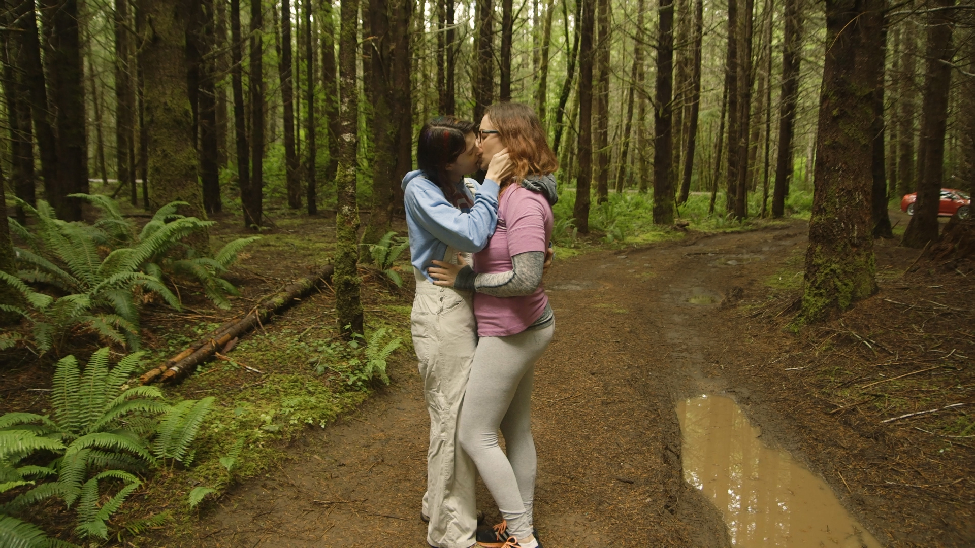 Lesbian outdoor rain forest strap fuck