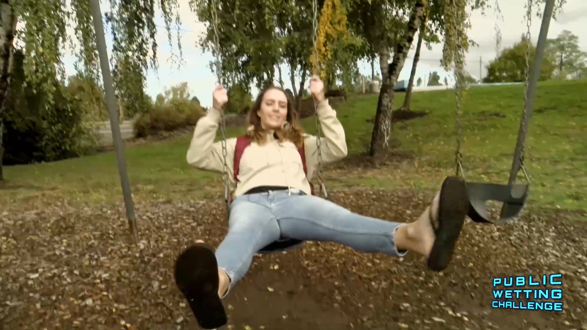 Alisha soaking her jean on the swing