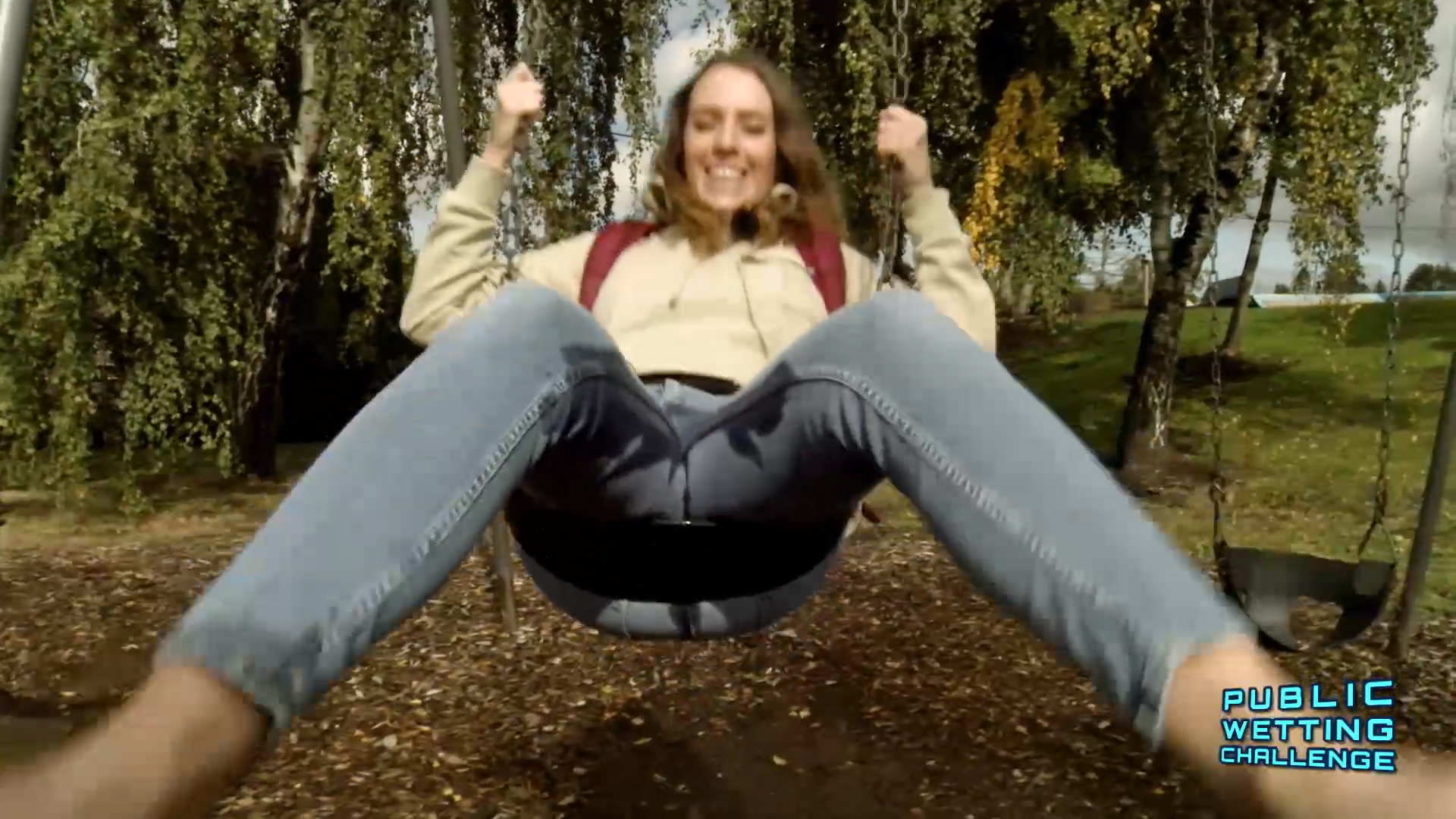 Alisha soaking her jean on the swing